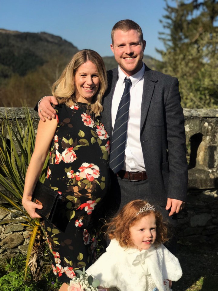  Laura, pregnant with her second child, with partner Dan and daughter Eva