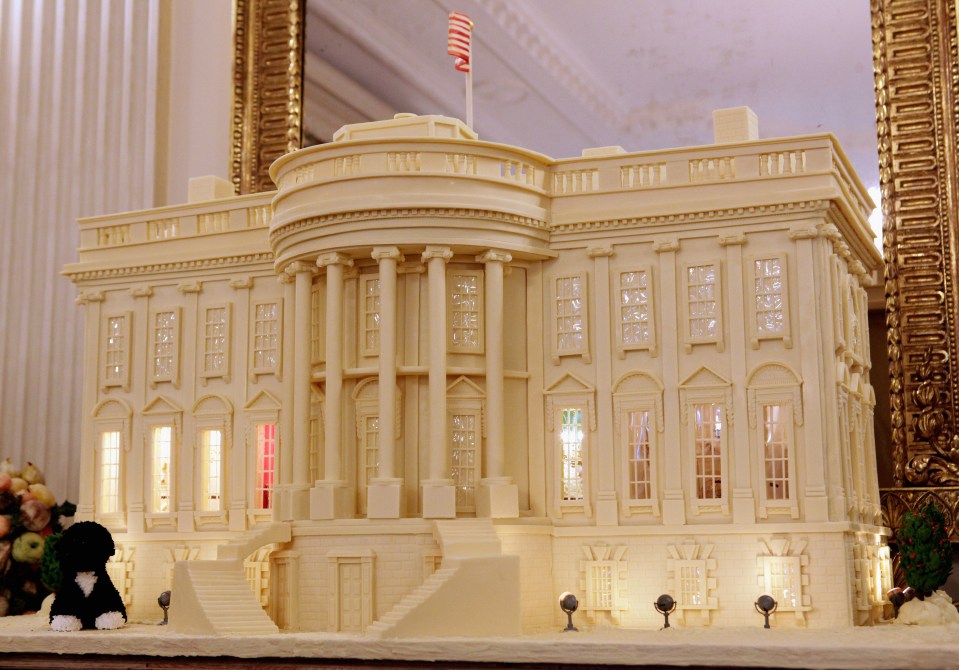 A replica of the White House, made from 400lbs of gingerbread, sits in the State Dining Room in 2011