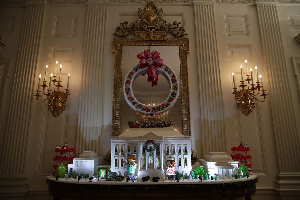 The 2016 White House Gingerbread House stands on display inside the room