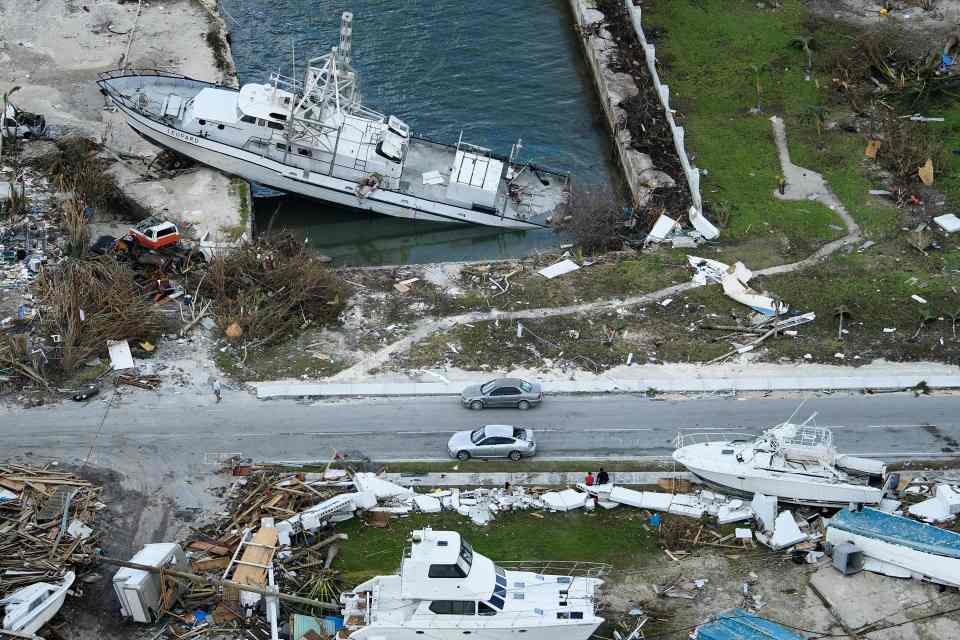  Boats lie where they were tossed onto the land in the Bahamas