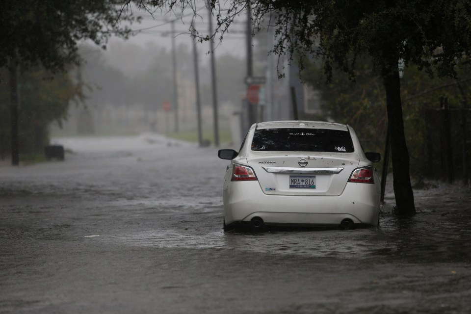  A car on a flooded street during Hurricane Dorian in Charleston, South Carolina