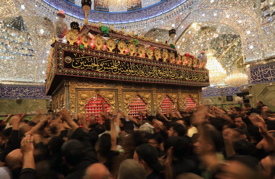  Iraqi Muslims gather at a shrine in the holy city of Karbala, where the Battle of Karbala took place in 680AD