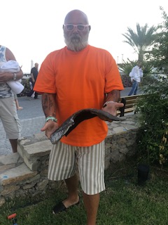  Stephen Cross holds a huge piece of shrapnel found outside his hotel