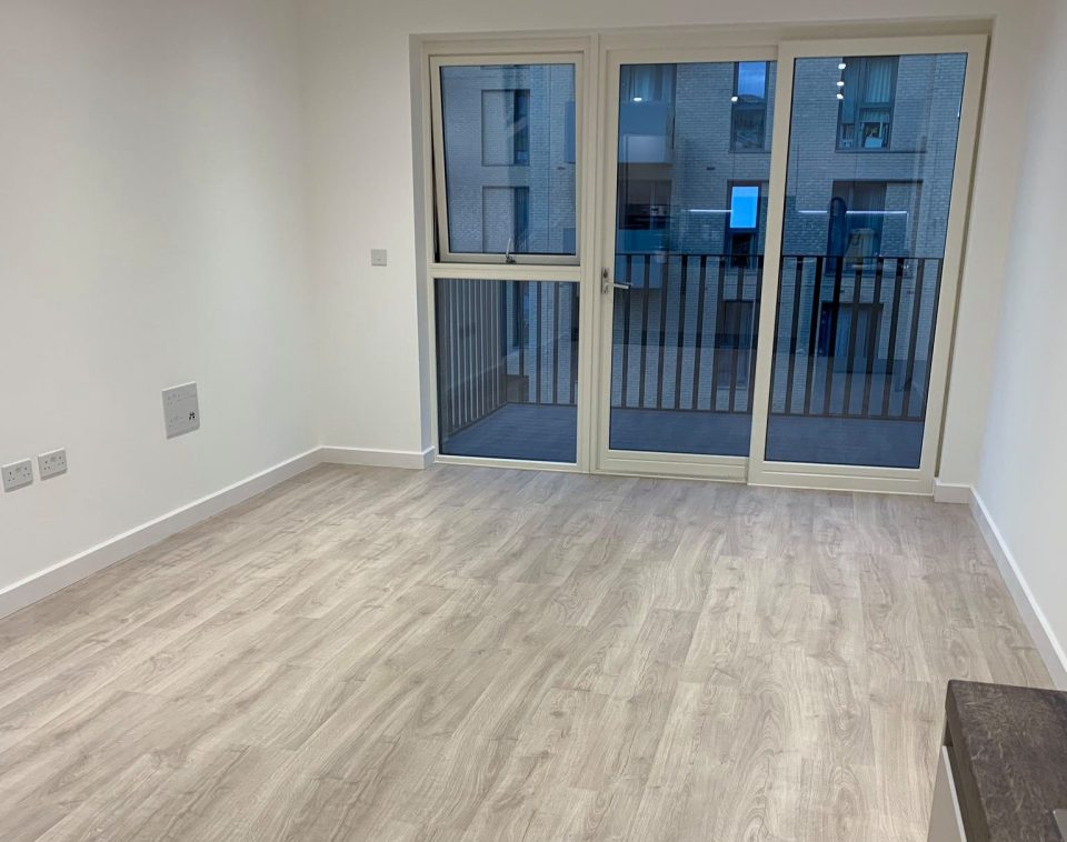  The living room was fairly standard with wooden flooring throughout