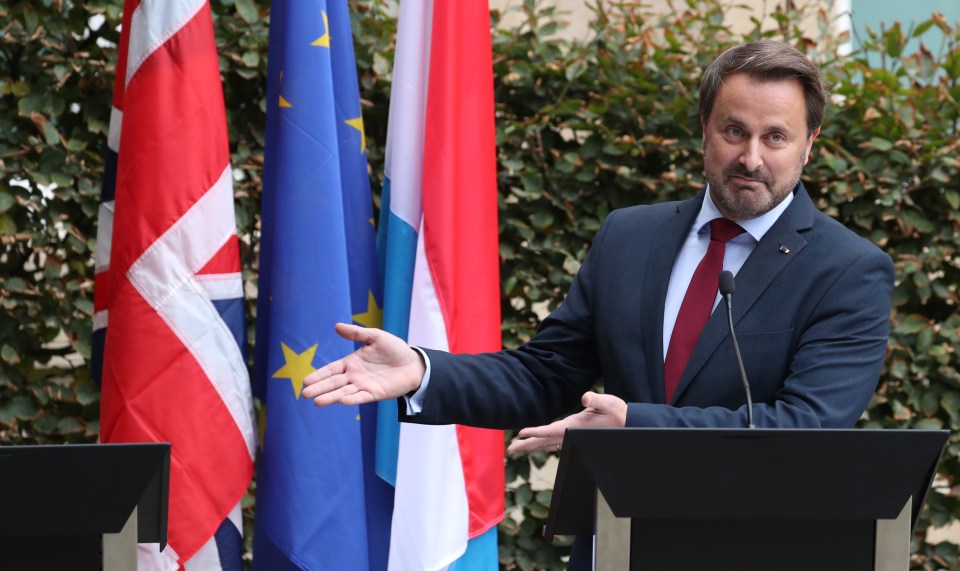  Xavier Bettel milked the whooping cheers and applause from anti-Brexiteer protesters after empty chairing Boris Johnson in Luxembourg