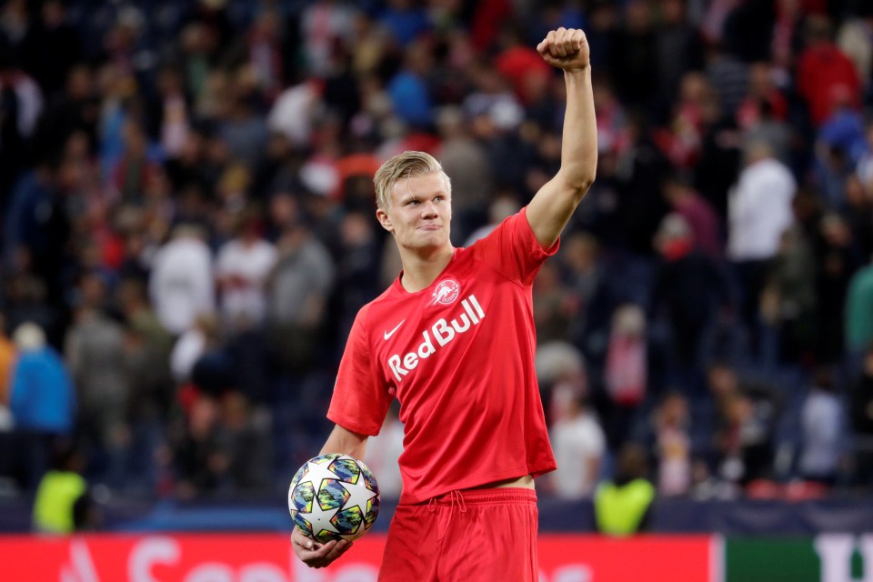  Erling Haaland celebrates with the match ball after an impressive display