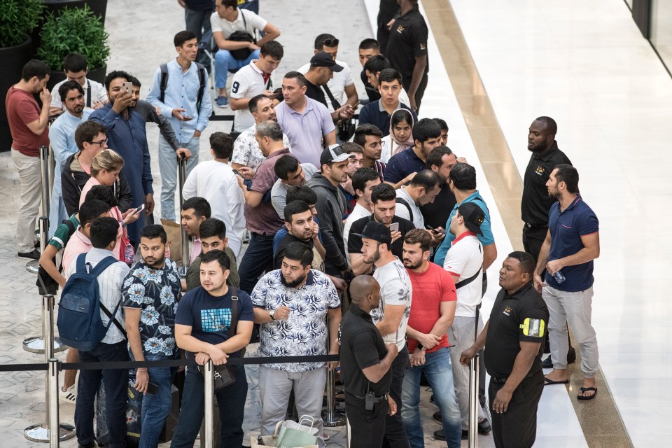 Apple fans also queued in Dubai