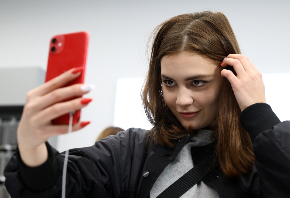 An Apple fan enjoys the updated selfie camera