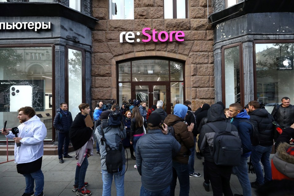 A crowd gathered outside an Apple store in Russia