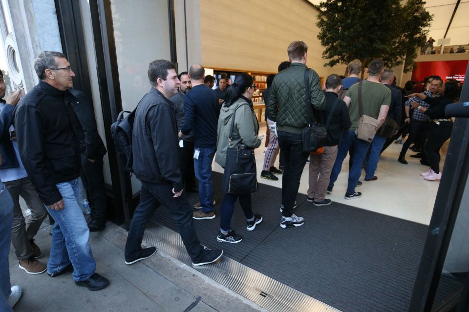  The Regent Street customers were queuing to collect their pre-ordered phones