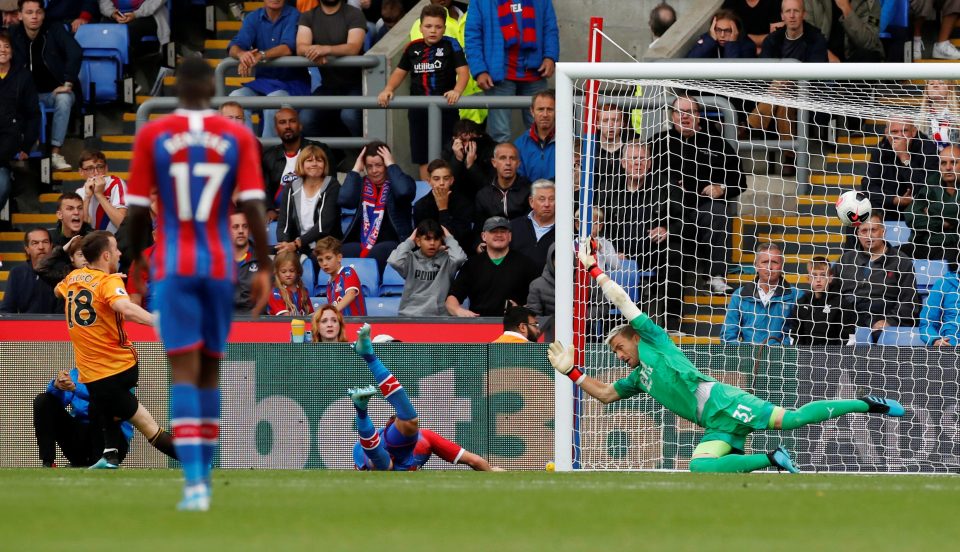  Diogo Jota watches as his 95th minute shot earns ten-man Wolves a point