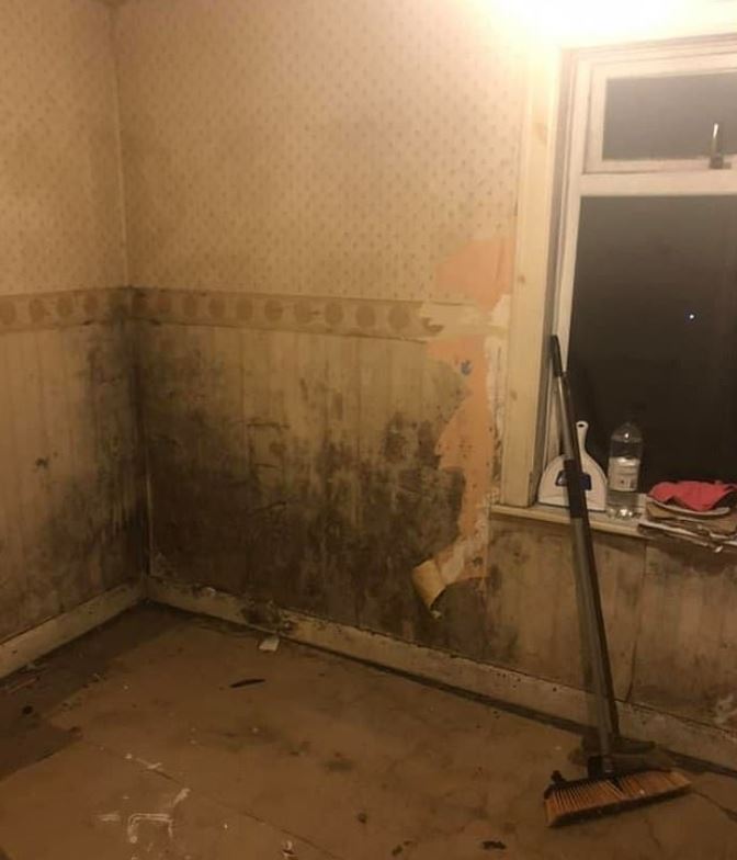  The room previously had mould on the walls and dated wallpaper