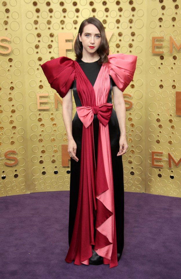  Zoe Kazan went bold in this black Gucci dress which featured bright red sleeves that cascaded to the front