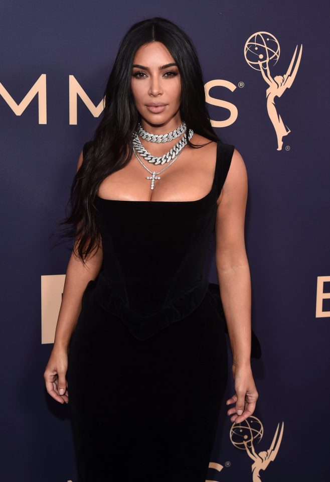  Kim showed off her curves in a black gown on the purple carpet