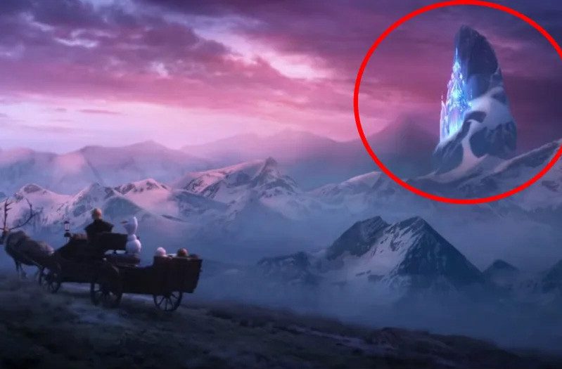  Elsa’s ice castle from the first film can be seen on a distant mountain top