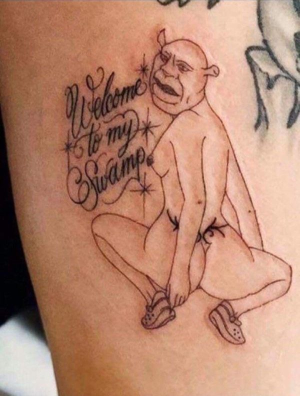  This bizarre shrek-inspired tattoo might scare off more people than it welcomes