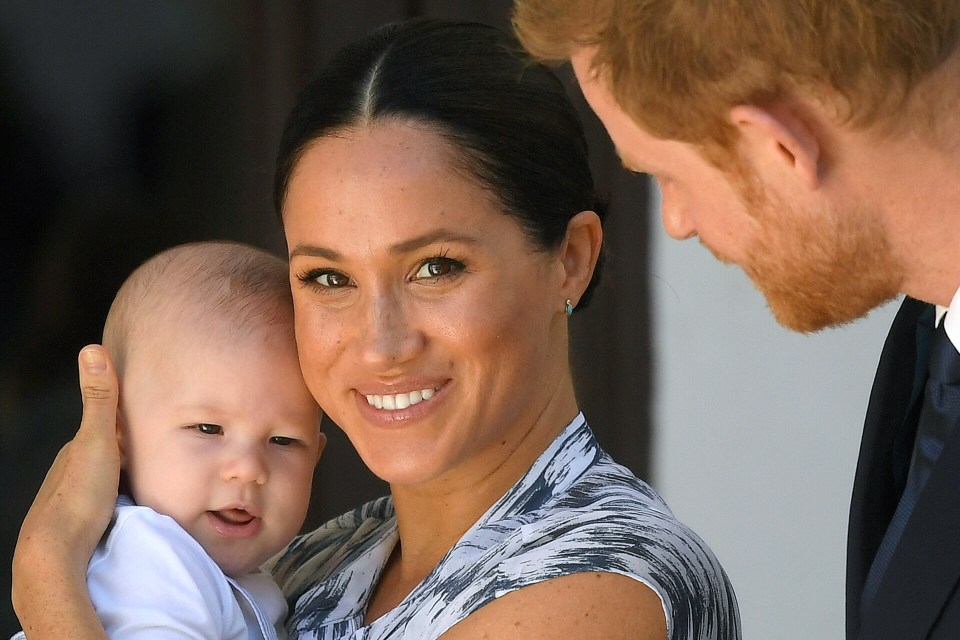  Doting Meghan with Prince Harry and Archie. The royals have been trying to win over hearts with their relaxed approach on the tour of South Africa