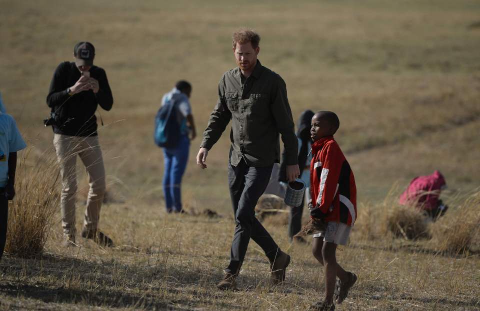  Prince Harry meets young locals today