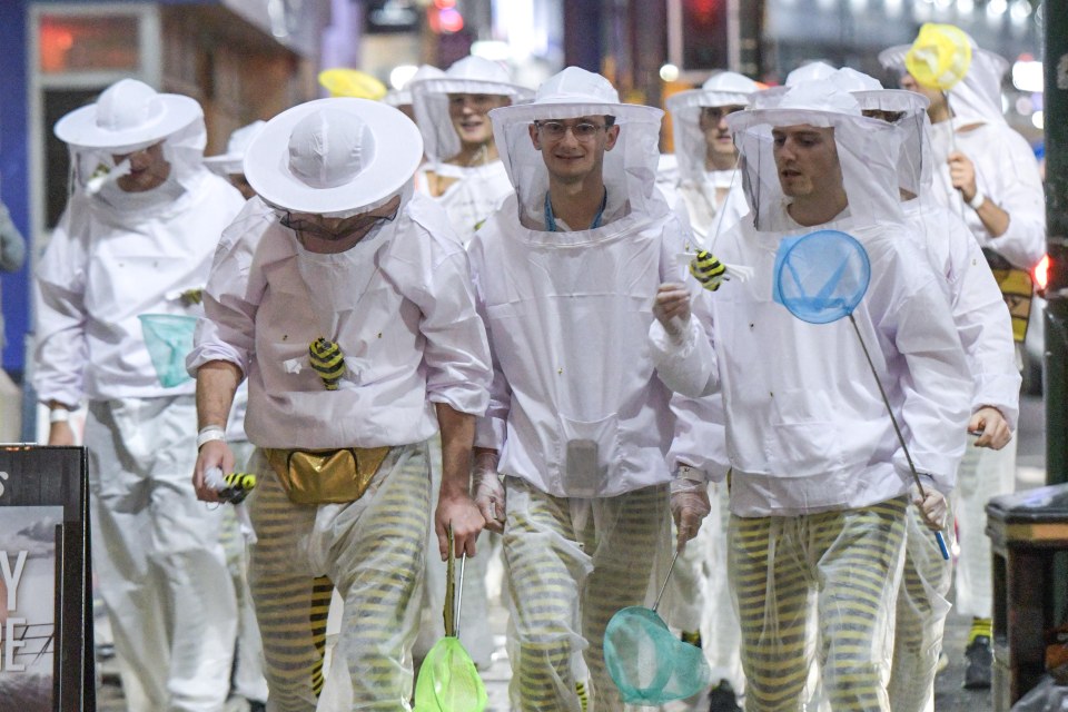  This creative group opted to dress as beekeepers