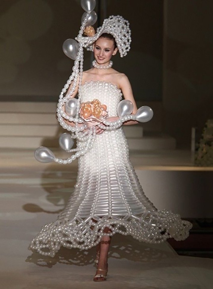  Who wouldn't want a wedding dress made from beads, pearls and balloons?