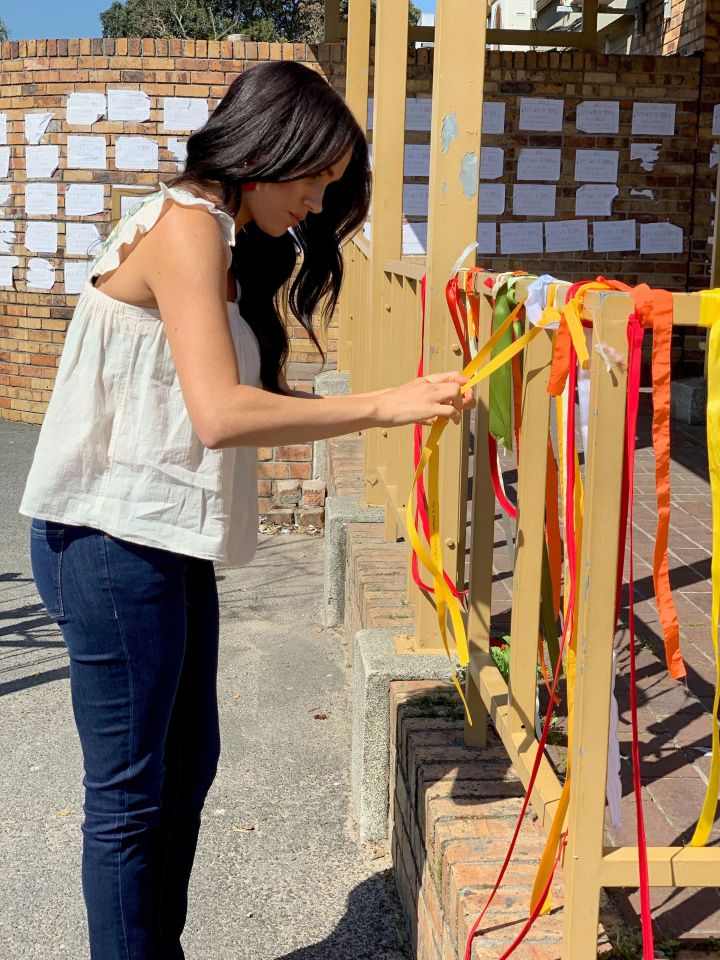  The Duchess of Sussex visiting the memorial in Cape Town to a murdered South African student