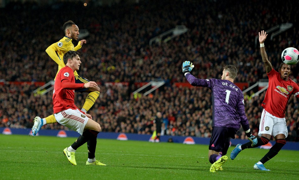  Ashley Young could be seen with his hand in the air as Aubameyang raced through to score Arsenal's equaliser