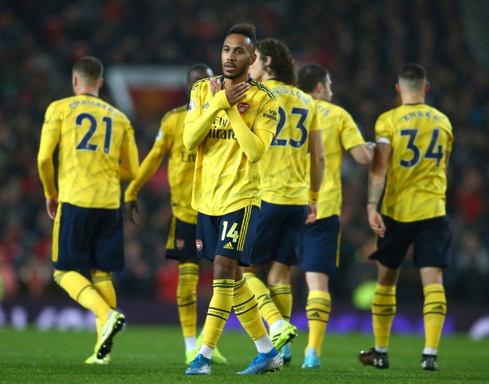  Aubameyang celebrates his goal as Arsenal drew with Manchester United in a poor game at Old Trafford