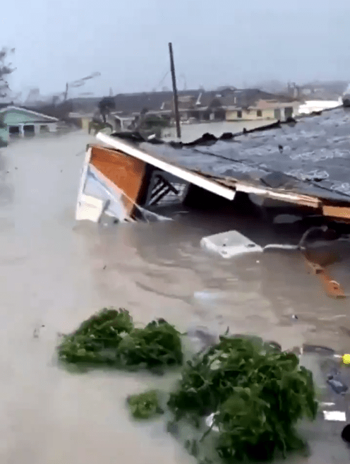  Flood waters have started to swallow up many homes