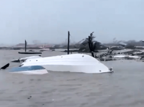  Video clips showed upturned boats left in the hurricane's wake