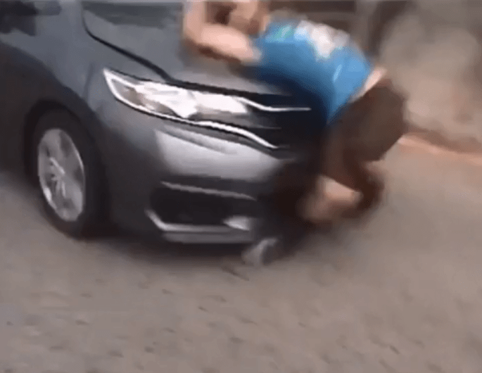  The car smashes into him from behind, breaking his pelvis and spine