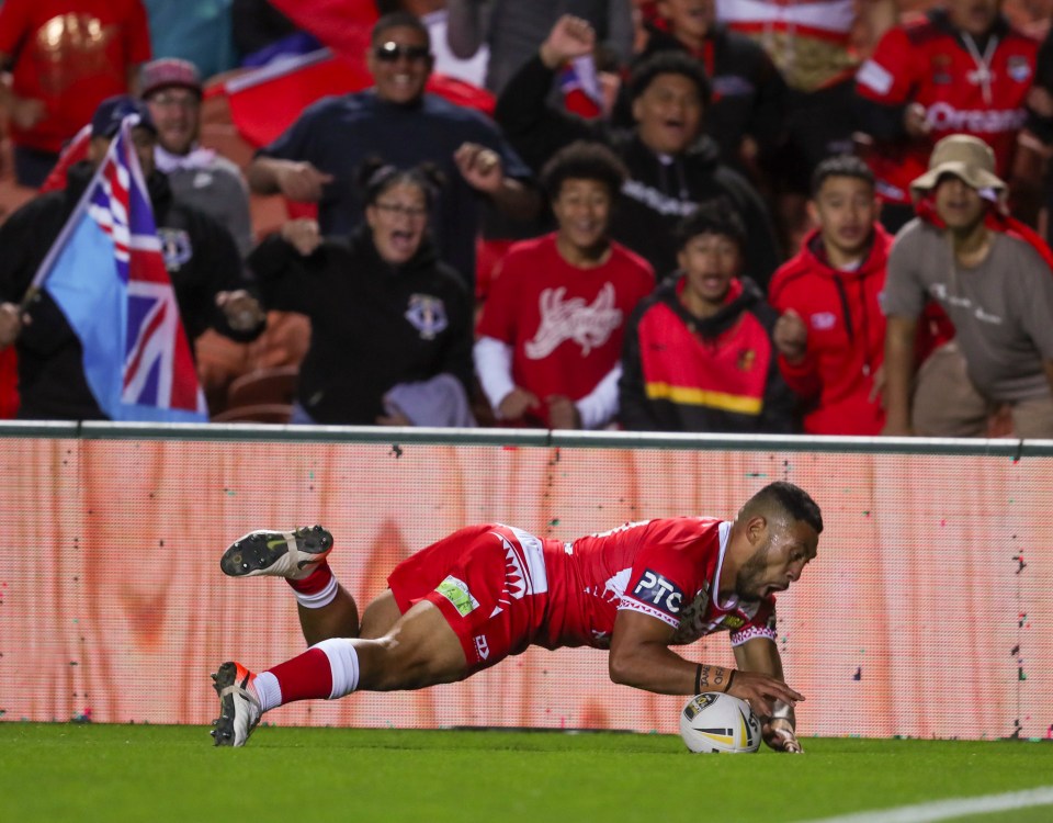  Sione Katoa finished a miraculous second try for Tonga