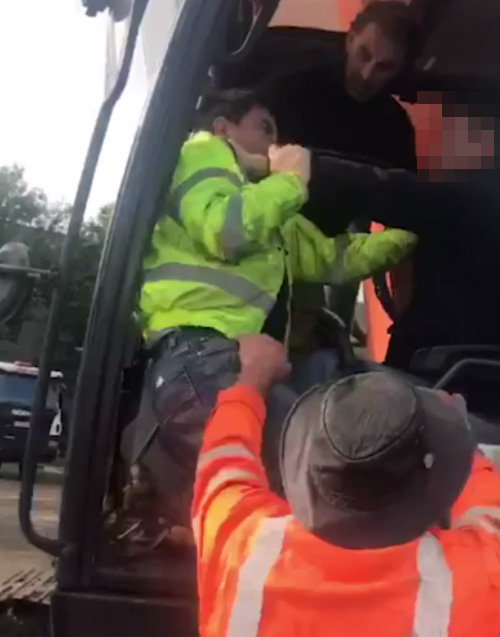  His colleagues tried to wrestle him out of the digger