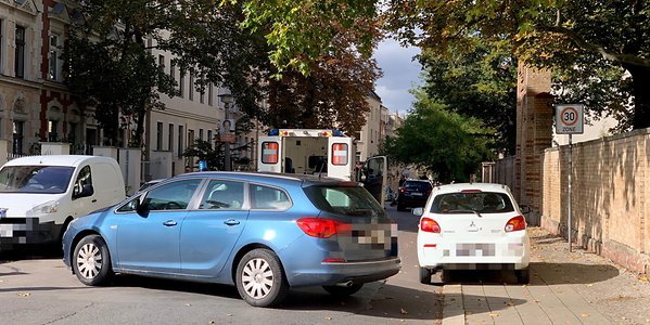  An ambulance at the scene of today's shocking shooting on Humboldtstrasse in Halle