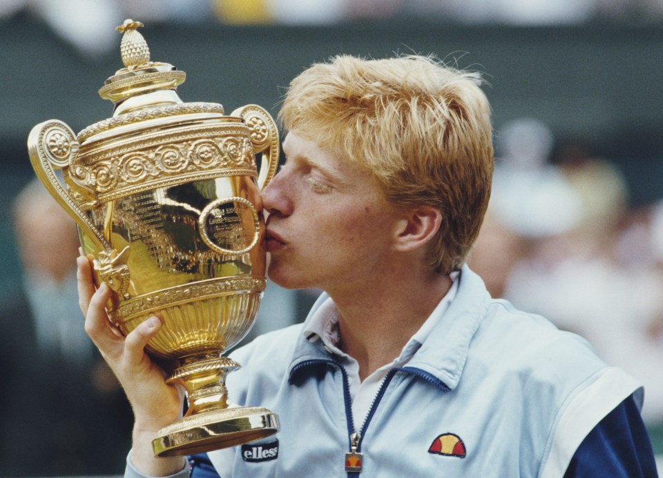  Becker is seen kissing the Gentleman's trophy following his Wimbledon win in July 1985