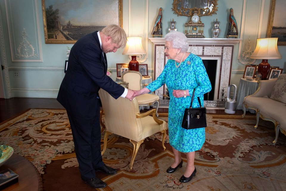  The portrait of Harry and Meghan was last seen in the room in July when Boris Johnson visited the Queen