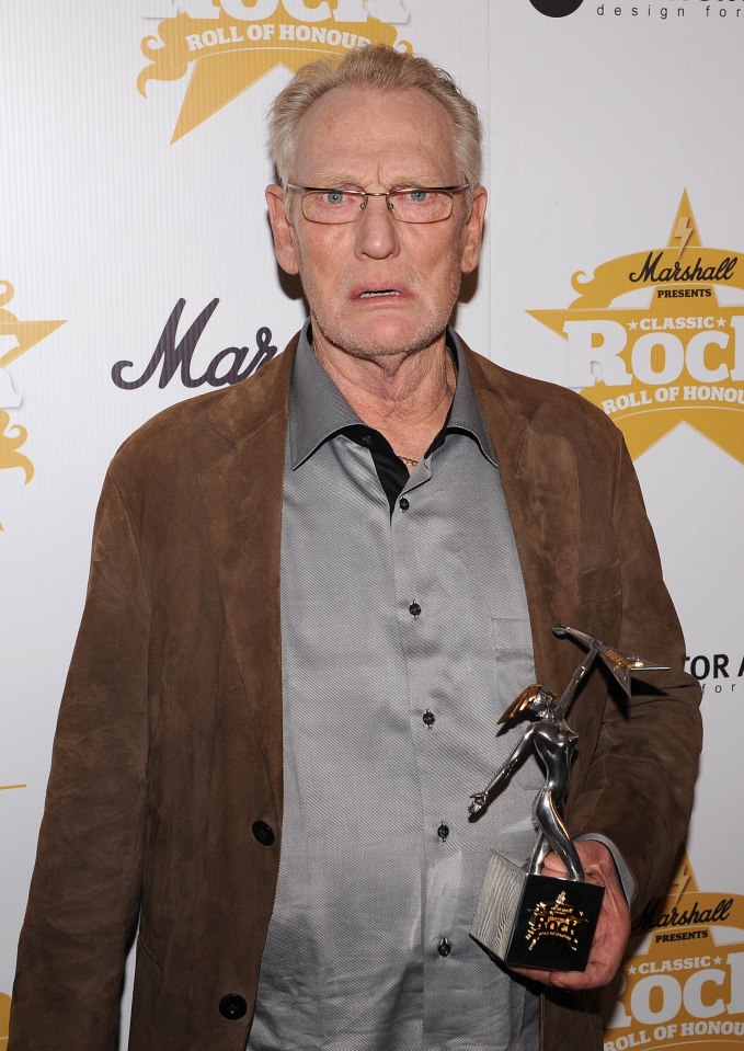  Holding a gong at the Classic Rock Roll of Honour awards in 2009