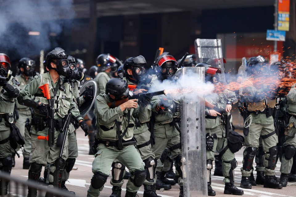  Police fire tear gas to disperse anti-government protesters