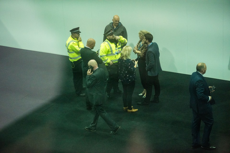 Police scrambled to a room at the Tory party conference amid reports of a scuffle