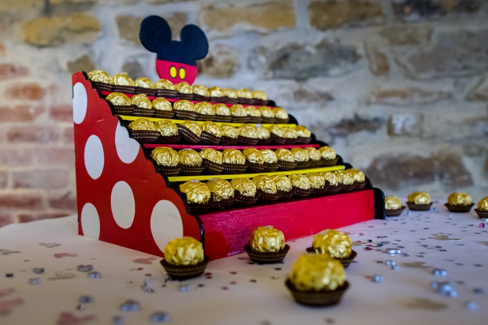  The bride made everything herself for her wedding, including this creative Ferrero Roche stand in Mickey Mouse colours