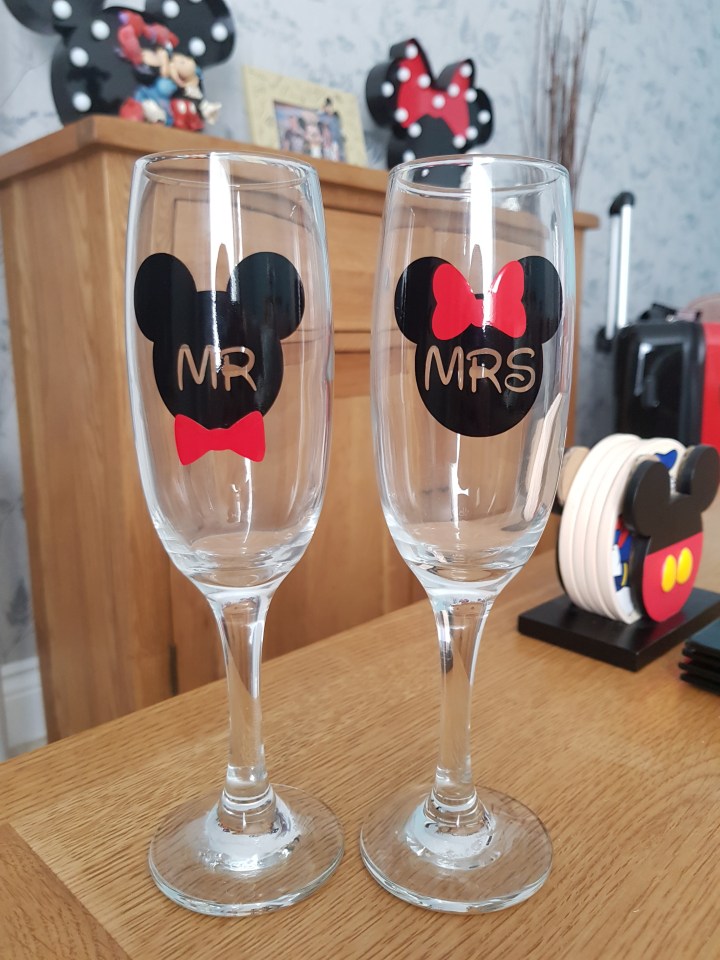  The bride and groom were able to toast their marriage with champagne flutes themed on the famous mice