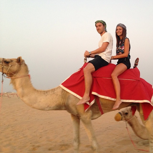 The couple on a camel in Dubai