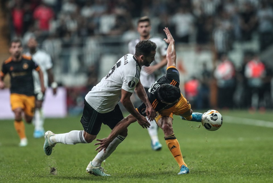  Pedro Neto (R) in action against Besiktas' Douglas (L) in the Europa League clash