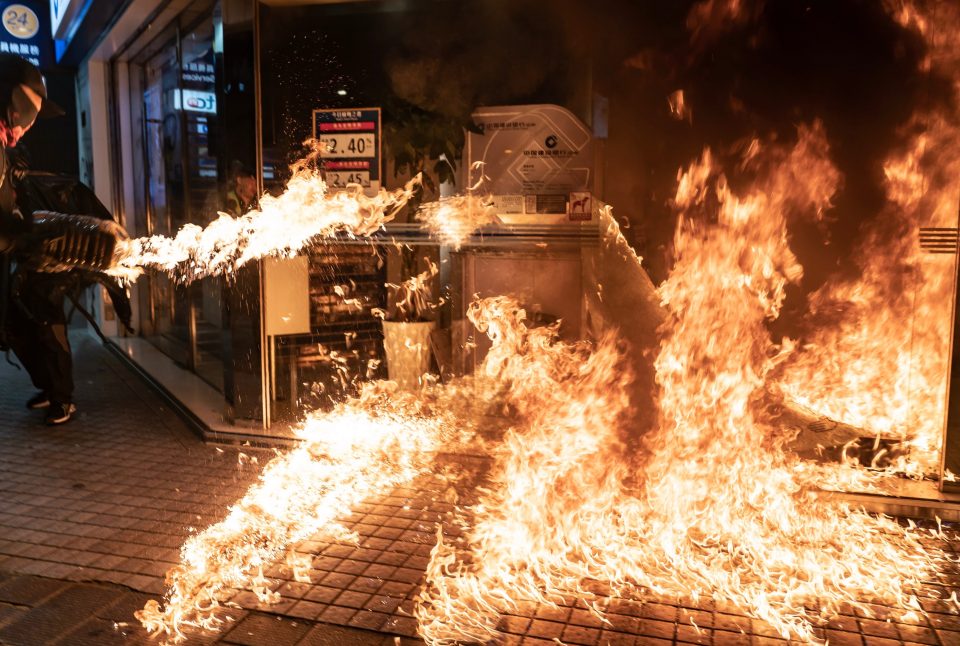  Pro-democracy protesters set a fire at China Construction Bank