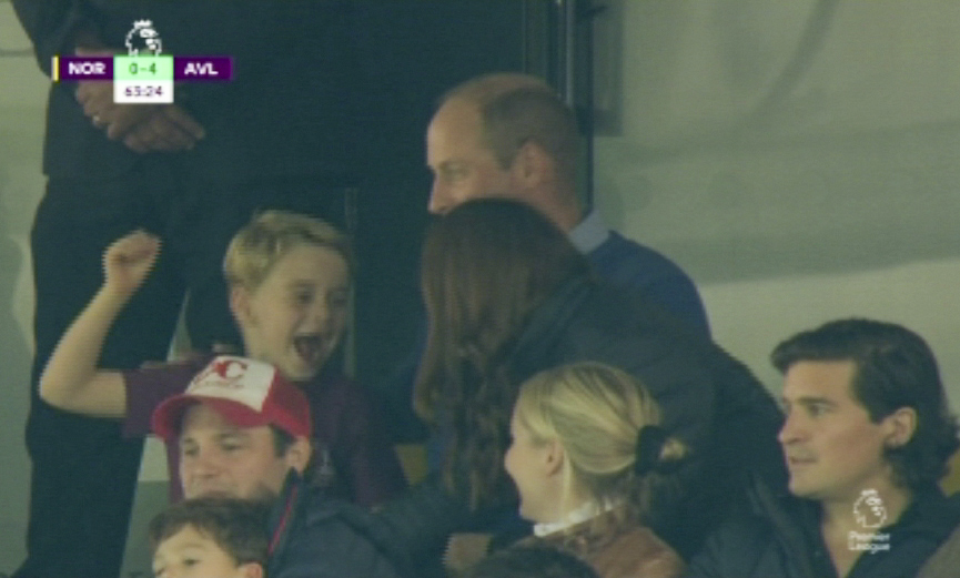  Kate leaned over to share in his excitement