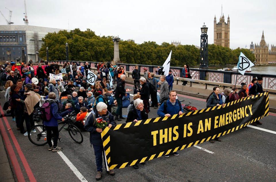  Extinction Rebellion activists block Lambeth Bridge during the protest in London