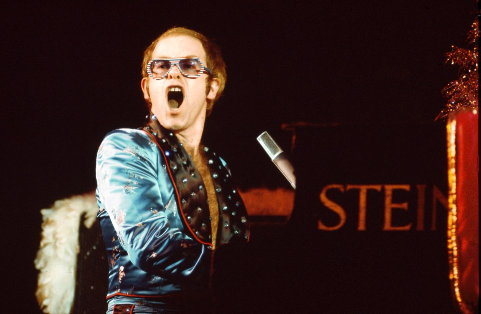  Elton John performing at the Hammersmith Odeon in London in the 1970s. The star writes that he first got hooked on cocaine in 1974