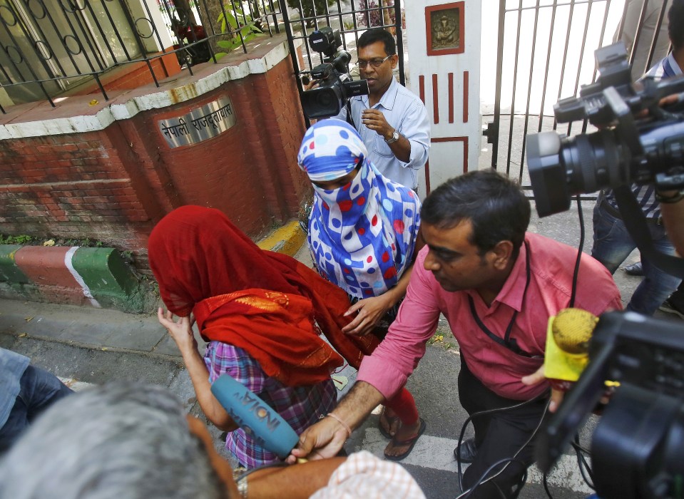  The women are pictured outside Nepal's embassy in New Delhi, India, in September 2015