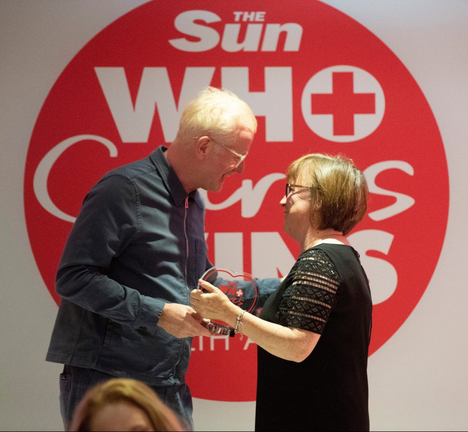  Chris Evans hands over Best Nurse award to Liz Monaghan who set up the Purple Rose care initiative