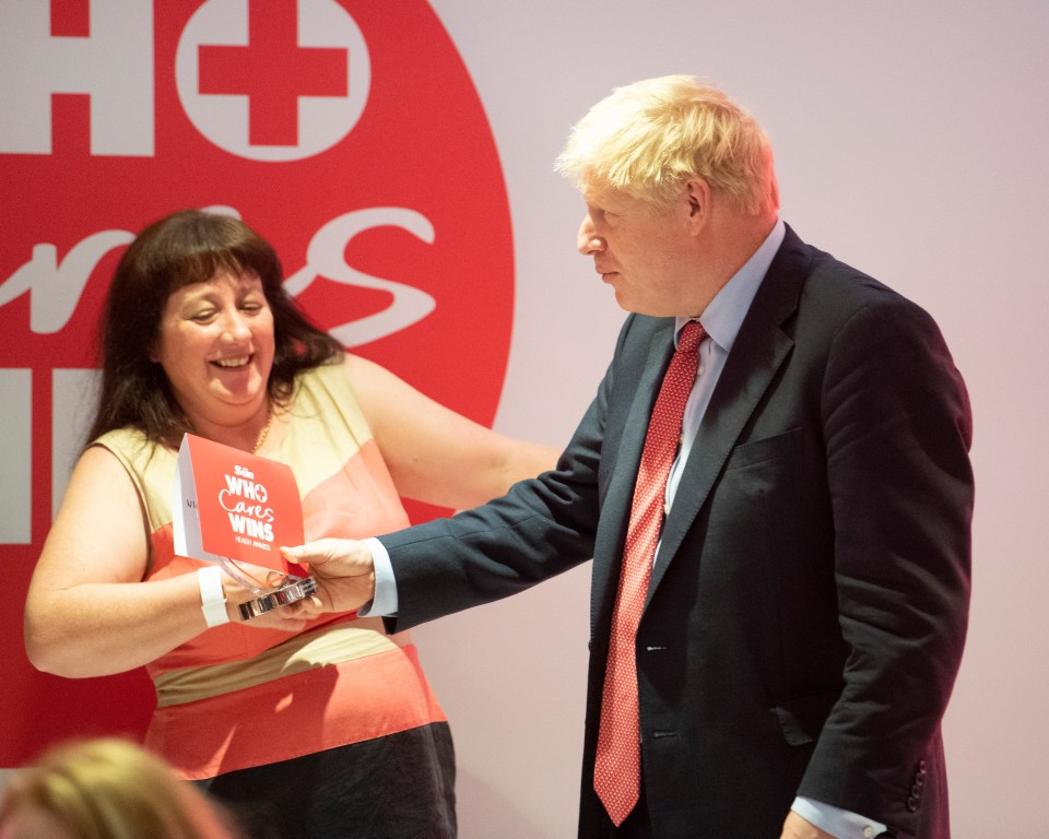  PM Boris Johnson presents NHS porter Ruth Lowe with the Ultimate Lifesaver award