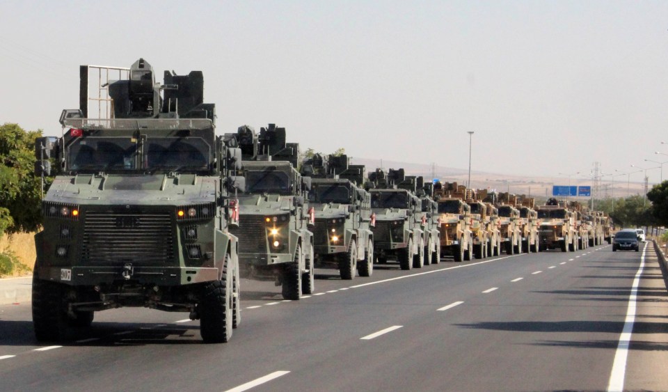  Scores of military vehicles clogged roads approaching the frontier